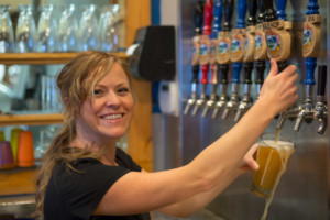 bartender pouring micro brew beer in hamilton montana